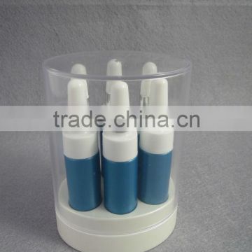 cosmetic package with blue mini bottle