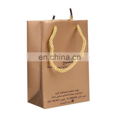 Black Embossed Gold Logo Paper Shopping Bag With Handle photo-4