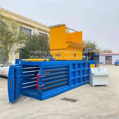 Waste paperboard used book horizontal hydraulic packer mineral water bottle beverage bottle pressing machine