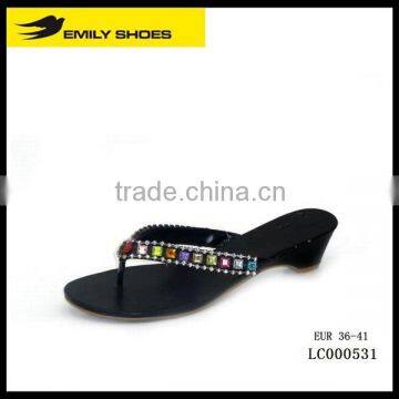 Lady's multi-colored diamond wedged slipper