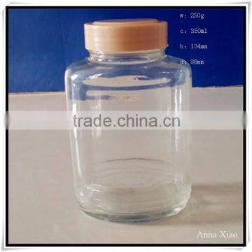 China Made 350ml Glass Honey Jars With Plastic Caps