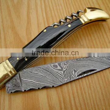 A BUFFALO HORN HANDLE DAMASCUS STEEL LAGUIOLE KNIFE WITH CORK SCREW