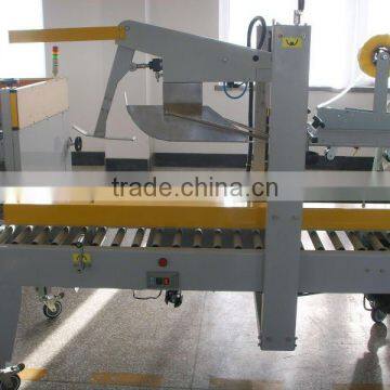 Semi-Automatic Flaps Folding And Side Belts Driven Sealer