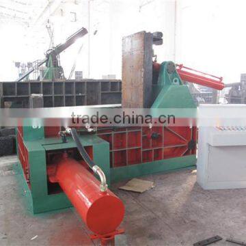 Horizontal baler with manual belting