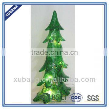 artificial christmas tree with traditional light decorations