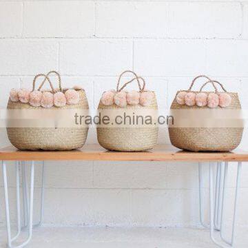 Blush color pompom Vietnam folding seagrass basket, natural color