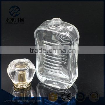 Fancy 100ml glass perfume bottle with decor cap