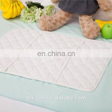 Waterproof bed mat bamboo fiber quilted fabric bed pad for maternity