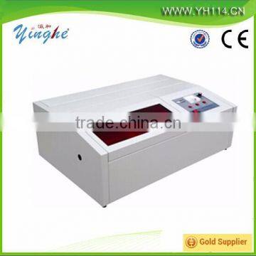 Mini fast feed 40W stamp laser engraving machine