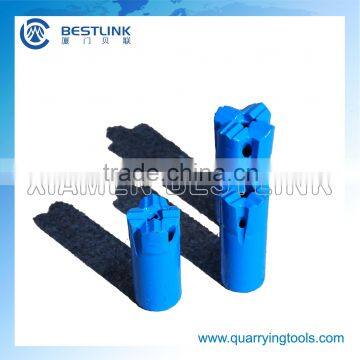 Diamond Cross bits for rock drilling