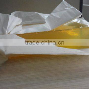 Hot melt adhesive for hook and loop tape