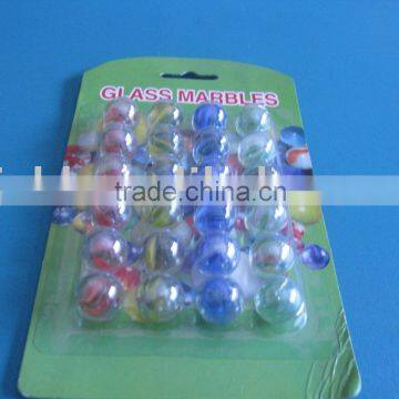transparent glass marble with petals inside