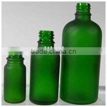 green frosted essential oil bottles