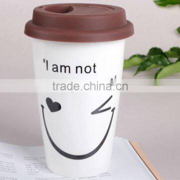 smiley porcelain coffee mug with silicon lid