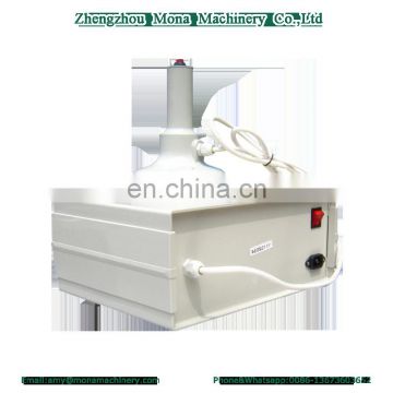 Electromagnetic induction sealer aluminum foil sealing machine