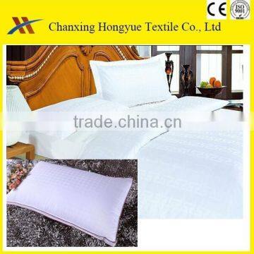 Pillows with white color used by Polyester brushed microfiber white fabric for hotel