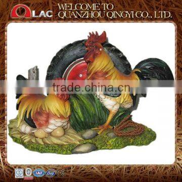 resin garden decorative two roosters beside wheel figurine