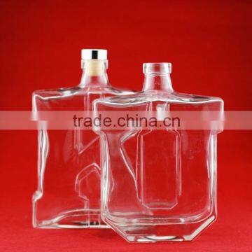 Wholesale hot sale world shape bottles butterfly shape vodka bottles handle bottles cork 500ml