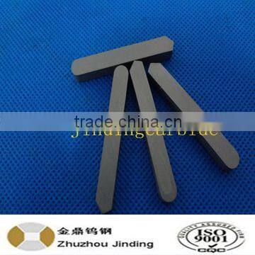 Sintered tungsten carbide bits for oil drilling