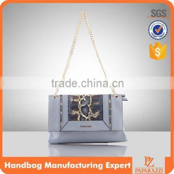 5115Guangzhou Handbag Manufacturer lady latest fashionable snake patent clutch sling chain strap woman bags.                        
                                                                                Supplier's Choice