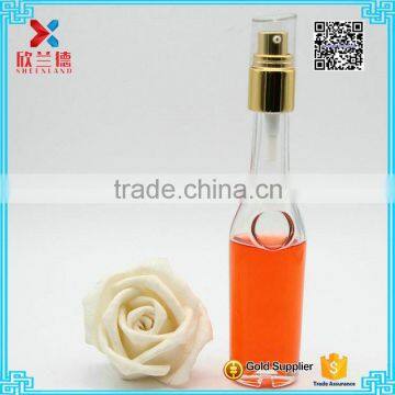 50ml round shape glass lotion pump bottle with gold sprayer for personal skin care