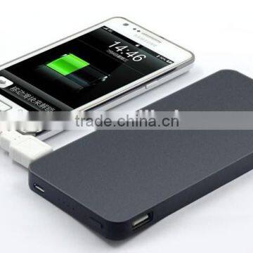 2014 Newly super thin power bank 10000mah with Three anti cell phone charger