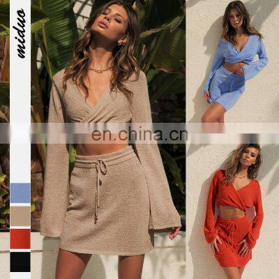 2021 Cross-border New Product Pure Color Women's Fashion Twisted Long Sleeve V-neck Sexy Top Drawstring Short Skirt Autumn Set photo-2