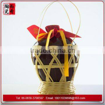 wine bottle with wicked basket