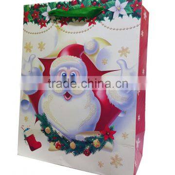 glittered paper shopping bag with Santa printing