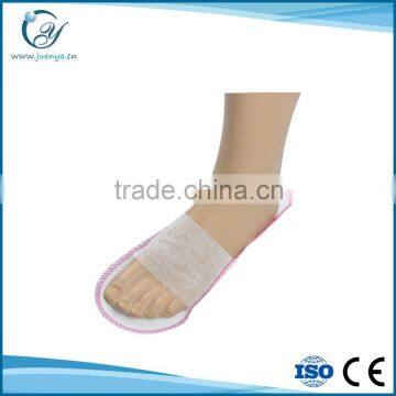 Disposable nonwoven slipper