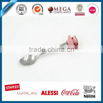 Lovely pink colored tea cup handle dessert spoon