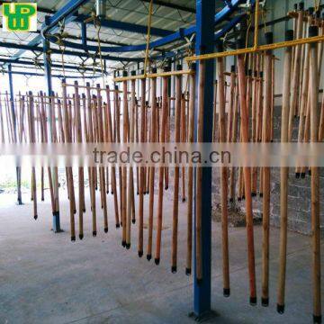 varnished wooden broom pole