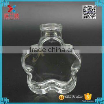 2016 decorative flowers shape clear glass jar/bottles with cork stopper