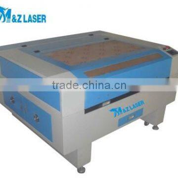 China New! Good Price Nonmetal Material Leather Rubber Plastic Bag Laser Engraving & Cutting Machine