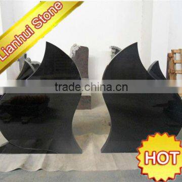 upright black double grave headstones