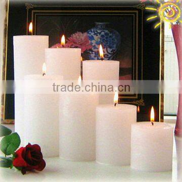 white scented decorative pillar candles