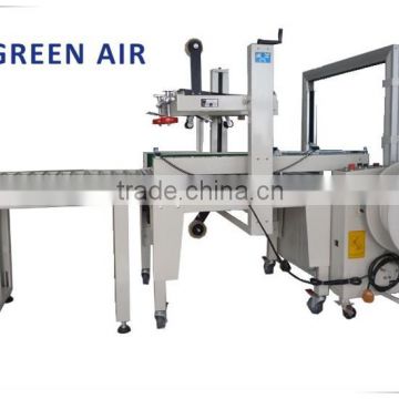 Automatic case/carton/box sealing and strapping machine