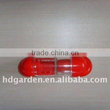 Plastic pill cutting tool