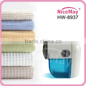 Electronic fabric clothes lint remover