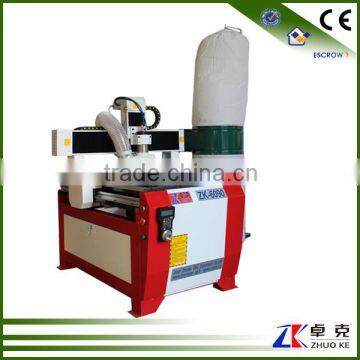 China cnc router1.5kw spindle round guide rail small CNC metal cutting machine with dust collector 6090