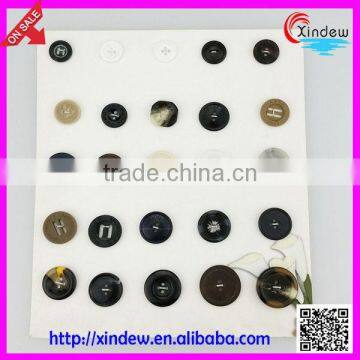 Large black plastic buttons