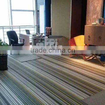 Woven vinyl area carpets