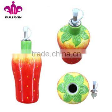 Ceramic oil and vinegar bottle with strawberry design