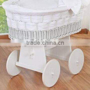 WHEELED WICKER CRIB
