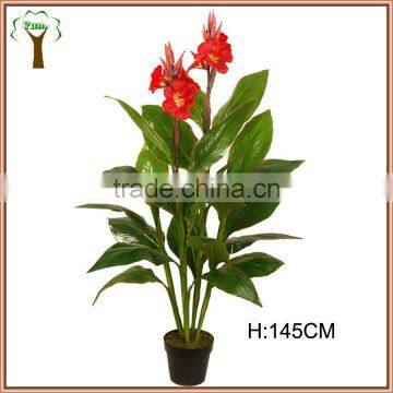 Fake banana plant with red flowers