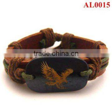 2012 Leather bracelet handmade with a ox bone carved an eagle in adjustable cord AL0015