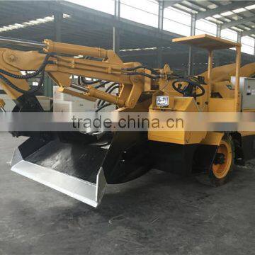 crawler mucking loader in tunnel for rock