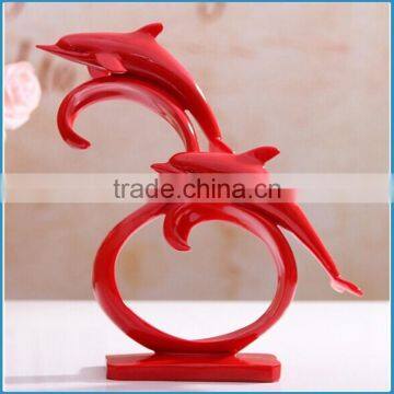 Resin craft couples dolphins, resin statues