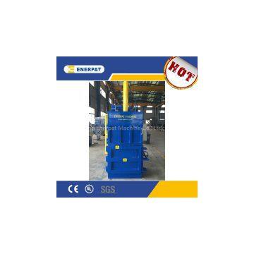 Vertical waste paper baler