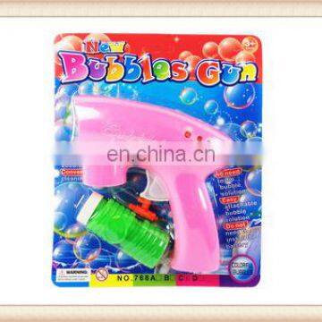 Battery operated LED light and musical bubble gun toy